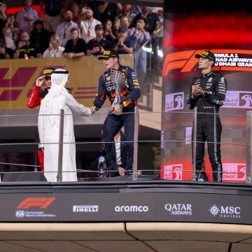 Hamdan bin Mohamed bin Zayed presents trophy to Formula 1 Etihad Airways Abu Dhabi Grand Prix 2023 winner Max Verstappen