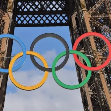 Omar Al Marzouqi raises UAE’s flag during Paris 2024 Olympic Games opening ceremony, marking a proud moment for the nation